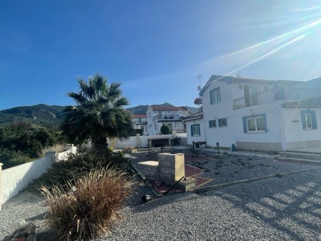 3+1 VILLA FOR SALE IN TATLISU, WITH MOUNTAIN AND SEA VIEWS, WITHIN A 750 M2 LAND, WALKING DISTANCE TO THE SEA.