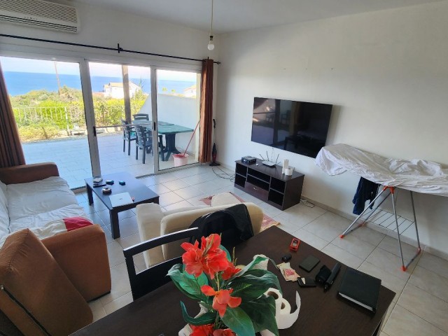 2+1 Flat for Sale with Sea and Nature Views in a Site with a Pool in Esentepe