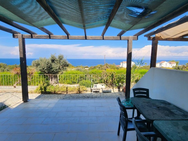 2+1 Flat for Sale with Sea and Nature Views in a Site with a Pool in Esentepe