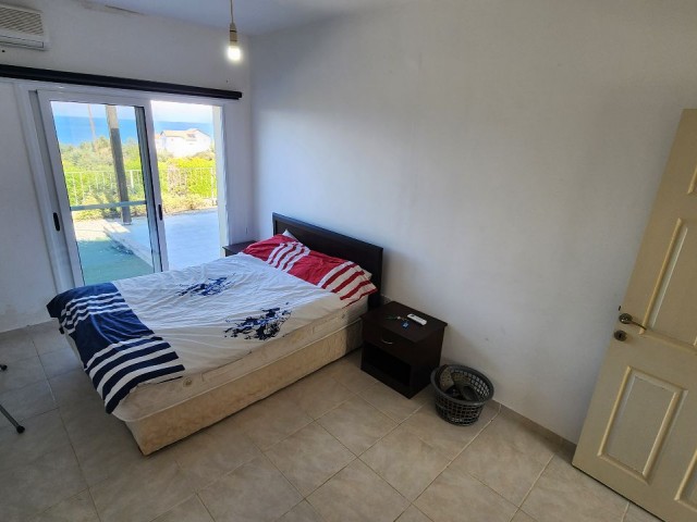 2+1 Flat for Sale with Sea and Nature Views in a Site with a Pool in Esentepe