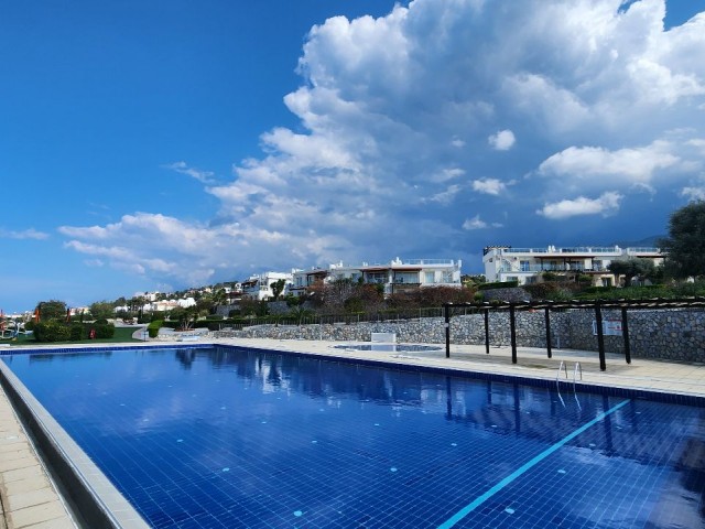 2+1 Flat for Sale with Sea and Nature Views in a Site with a Pool in Esentepe