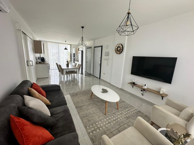 2+1 flat for sale in a site with pool in Alsancak