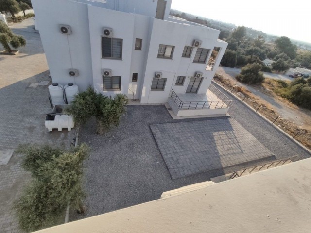 Schöne 2-Zimmer-Wohnung zum Verkauf in Catalkoy Girne (private Dachterrasse mit wunderschönem Meer- und Bergblick)