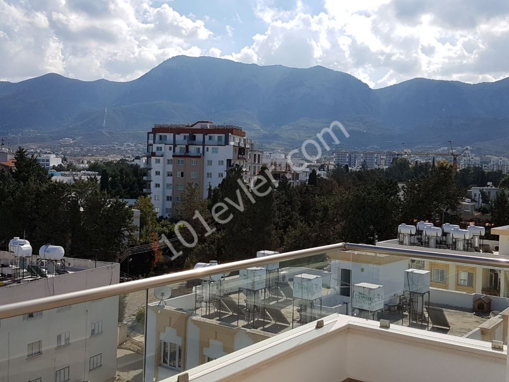 GİRNE AMFİ TİYATRO BÖLGESİNDE SATILIK DAĞ VE DENİZ MANZARALI 3+1 PENTHOUSE