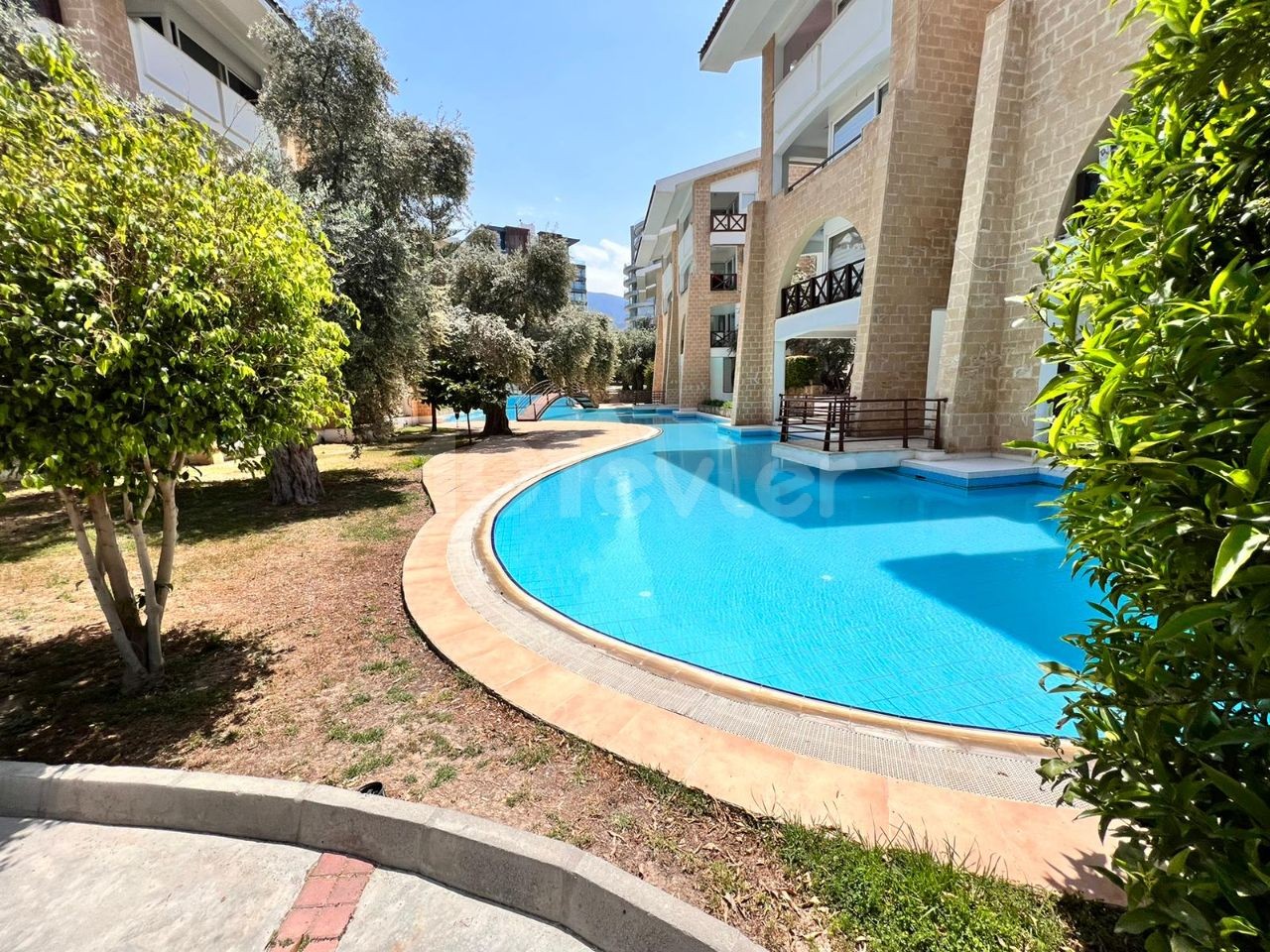 1+ APARTMENT WITH SHARED POOL FOR SALE WITH FURNITURE IN KYRENIA, CYPRUS ** 