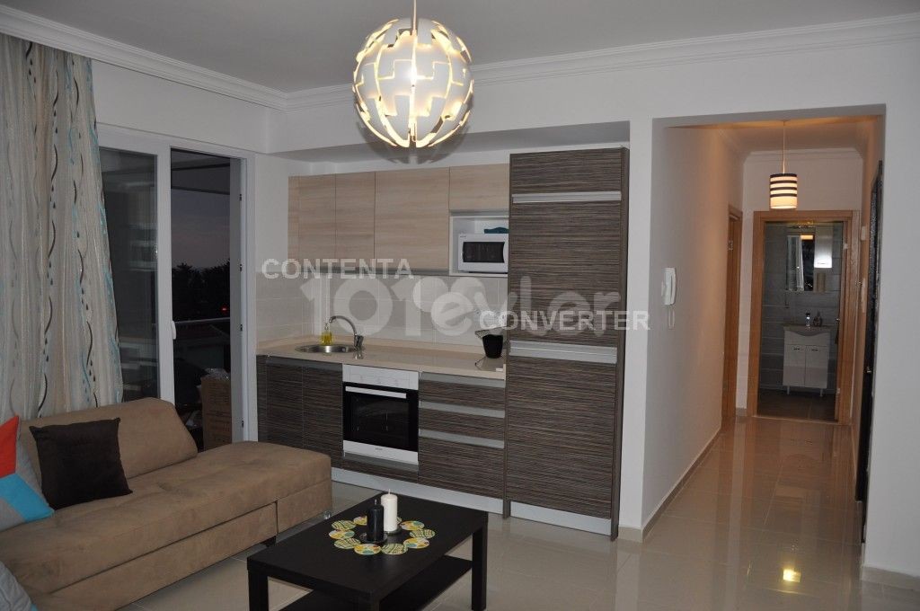 KYRENIA CENTRAL 1 + 1 APARTMENT FOR SALE ** 