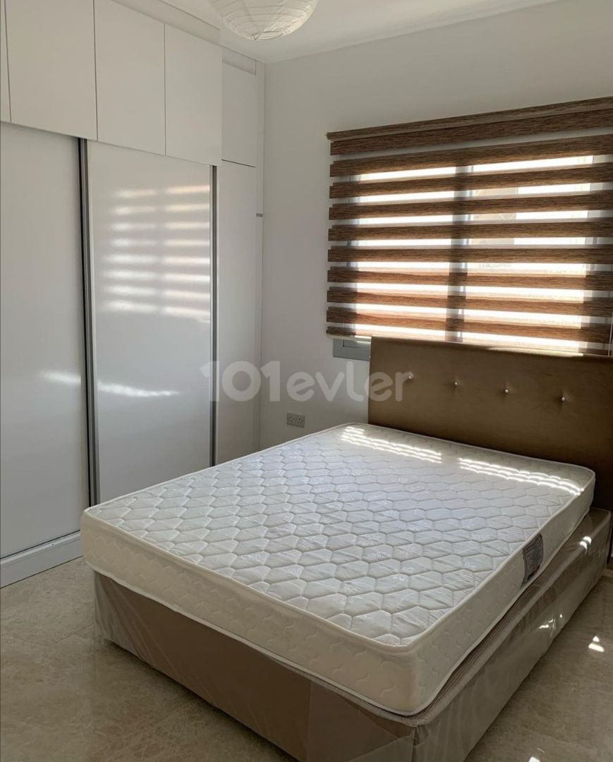 GİRNE MERKEZDE  EŞYALI 2+1 DAİRE