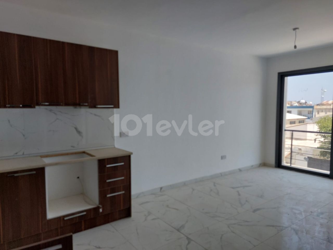 GİRNE KARAOĞLANOĞLU BÖLGESİNDE 1+1 SATILIK DAİRE