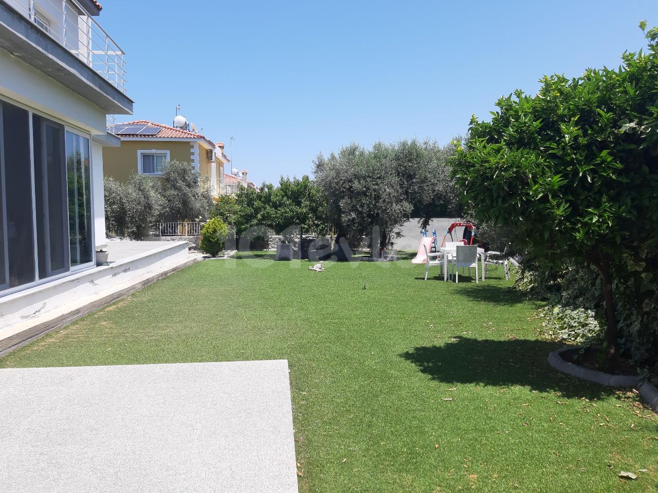 A DETACHED DUPLEX VILLA WITH AN EQUIVALENT COB, FIREPLACE, BARBECUE, GARDEN WITH AN INDOOR AREA OF 4 + 1, 290 SQUARE METERS ON A CORNER PLOT OF 600 SQUARE METERS WITH A FACADE Decking OUT ON BOTH SIDES, IN A VERY GOOD LOCATION IN KYRENIA ** 