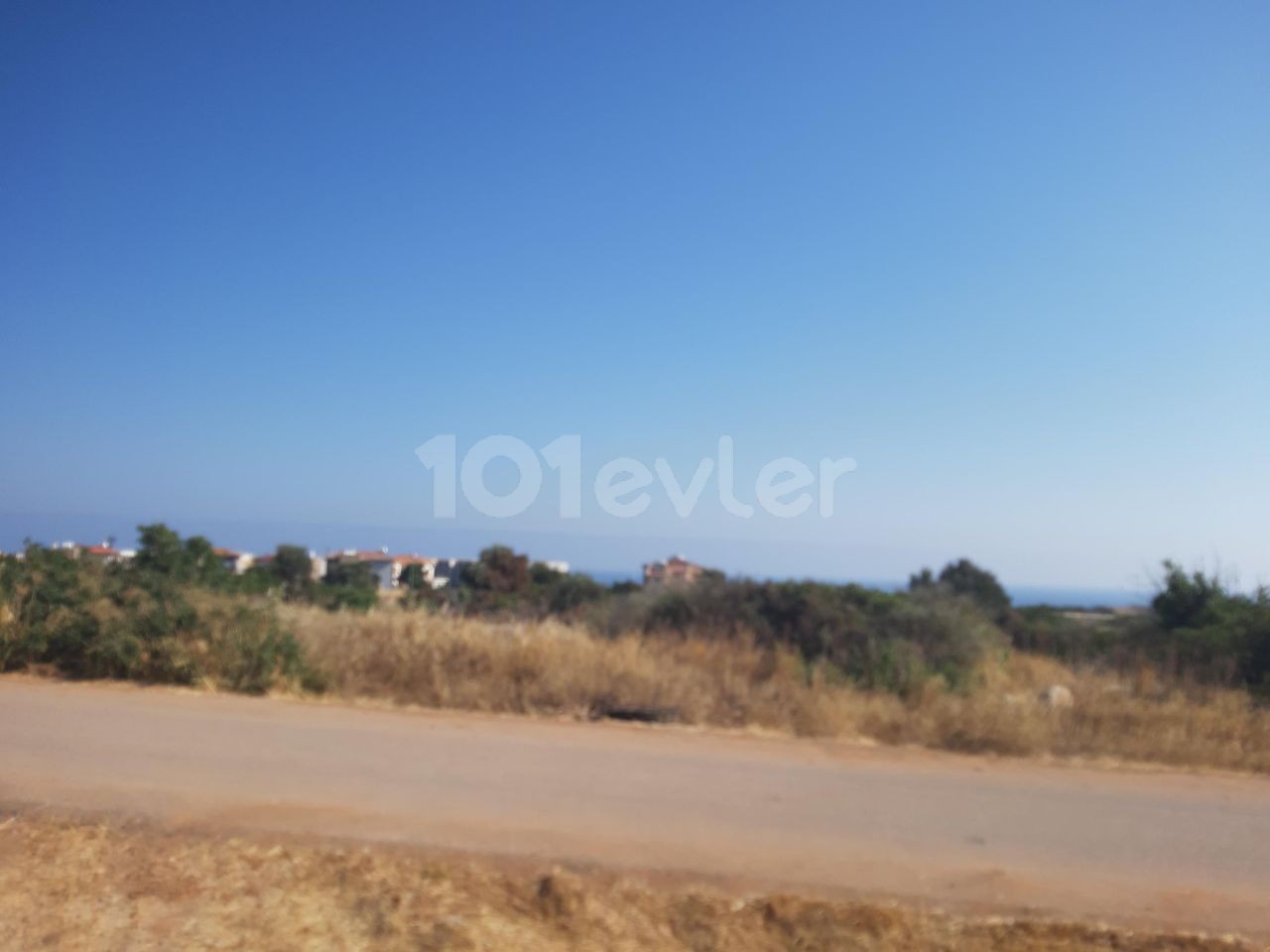 IN ÇATALKÖY, IN THE ELEXUS HOTEL AREA, CLOSE TO THE HOTEL AND THE SEA, IN A VERY GOOD LOCATION, WITH MOUNTAIN, SEA AND NATURE VIEWS, 6 ACRES 3 EVLEK SIZED, ZONED FIELD ** 