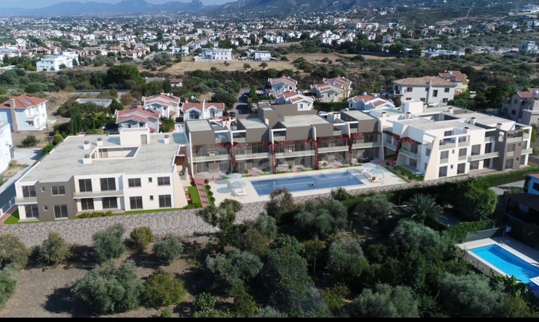 Kyrenia,Dogankoy | Duplex 2+1 Wohnung zu verkaufen | Gemeinschaftspool | Überdachte Garage | Vor Ort