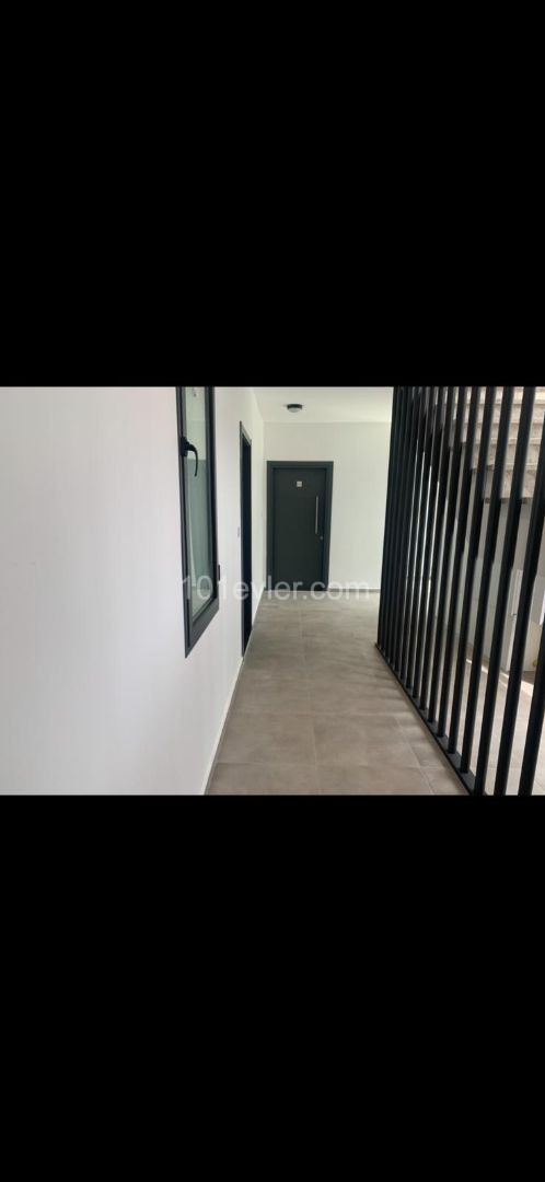 1+1 FLAT IN ALSANCAK WITHIN QUALIFIED SITE AND WALKING DISTANCE TO THE SEA ** 