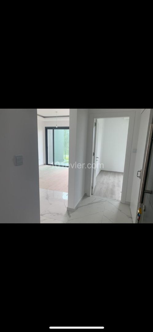 1+1 FLAT IN ALSANCAK WITHIN QUALIFIED SITE AND WALKING DISTANCE TO THE SEA ** 