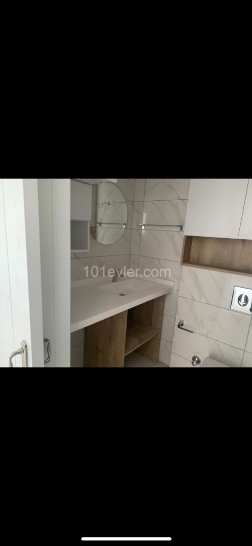 1+1 FLAT IN ALSANCAK WITHIN QUALIFIED SITE AND WALKING DISTANCE TO THE SEA ** 