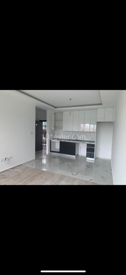 1+1 FLAT IN ALSANCAK WITHIN QUALIFIED SITE AND WALKING DISTANCE TO THE SEA ** 