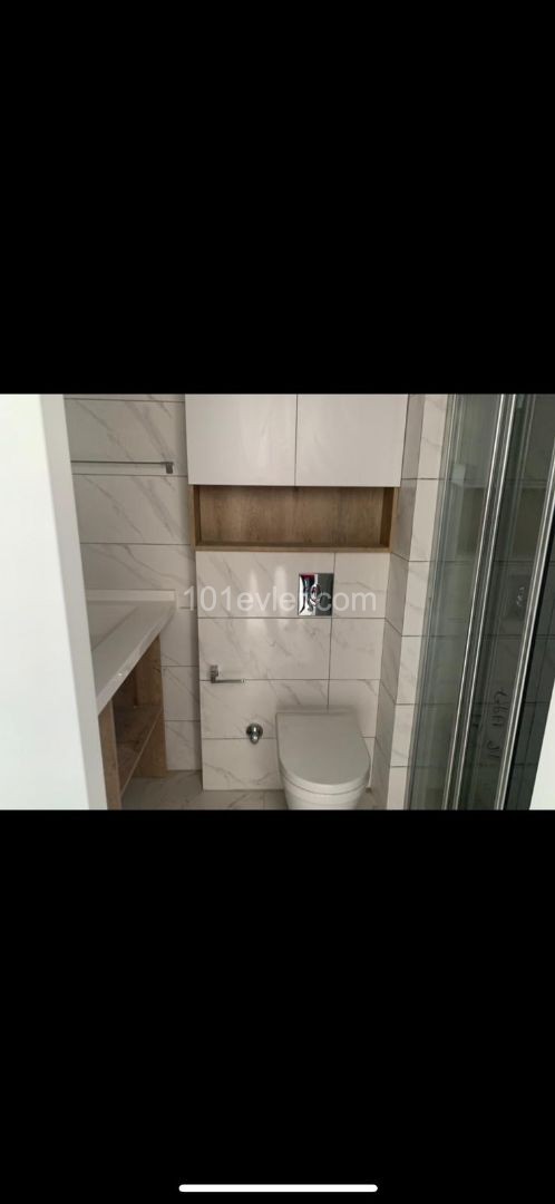 1+1 FLAT IN ALSANCAK WITHIN QUALIFIED SITE AND WALKING DISTANCE TO THE SEA ** 