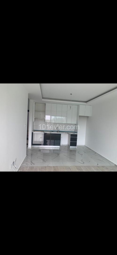 1+1 FLAT IN ALSANCAK WITHIN QUALIFIED SITE AND WALKING DISTANCE TO THE SEA ** 