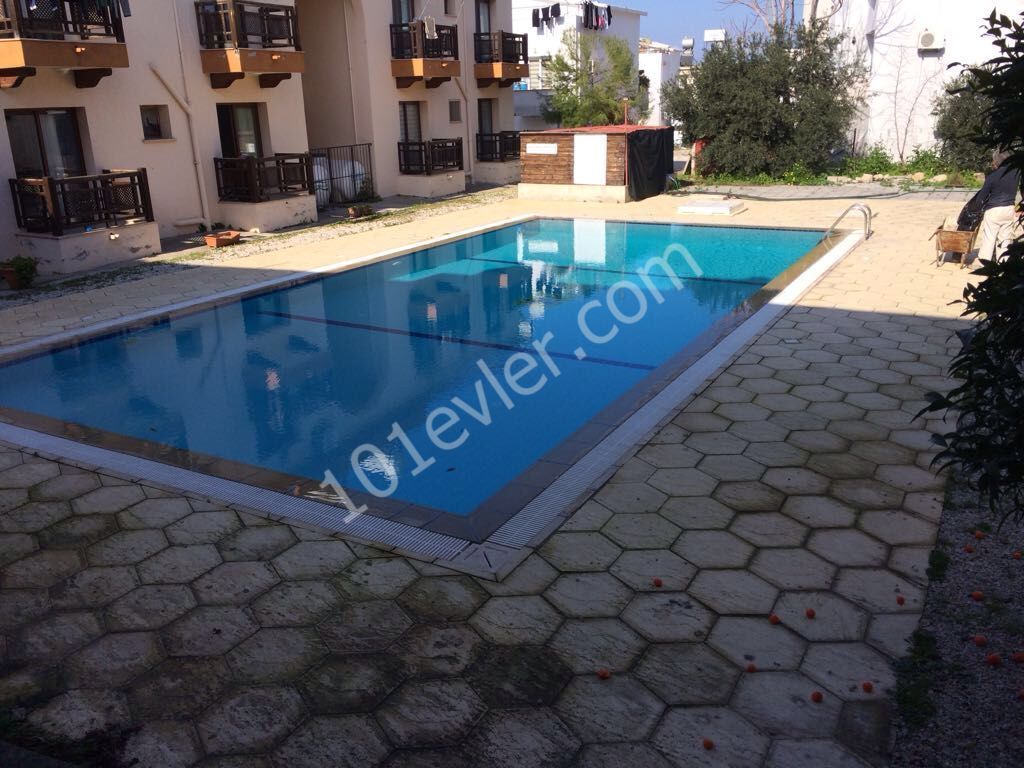 3 + 1 LUXURY APARTMENT WITH FIREPLACE, GARDEN, SPECIAL DESIGN FOR SALE IN DOGANKOY 140 SQUARE METERS OF LIVING SPACE 1 SPACIOUS HALL + OPEN KITCHEN + WHITE GOODS 2 BATHROOMS + WC 4 SPACIOUS BALCONIES 3 BEDROOMS SEMI-FURNISHED CENTRAL HEATING COMMUNAL POOL OUTDOOR GARAGE ** 