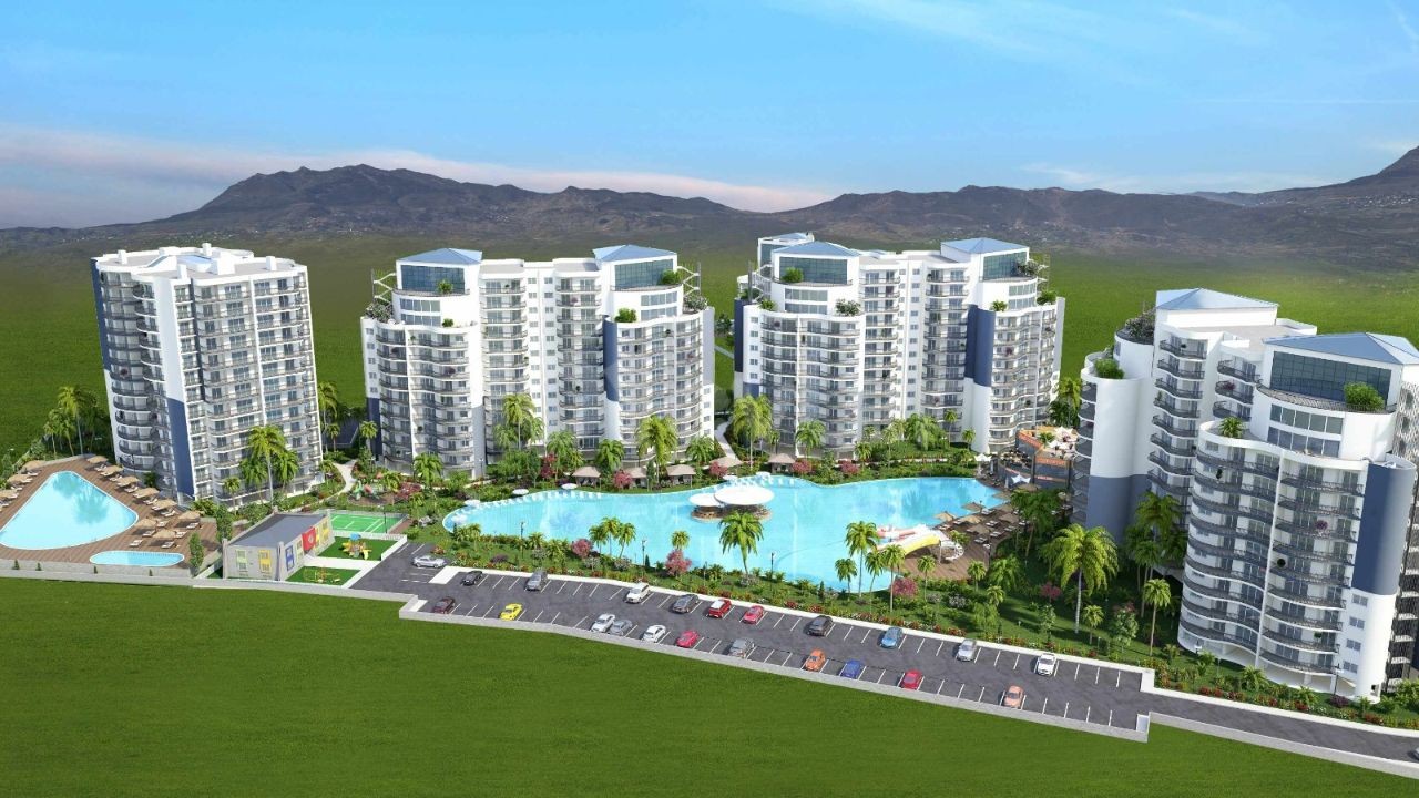 İSKELE LONGBEACH DE ÖDÜLLÜ BİR PROJE DE SATILIK DAİRELER 98,500stg'den BAŞLAYAN FİYATLARLA 