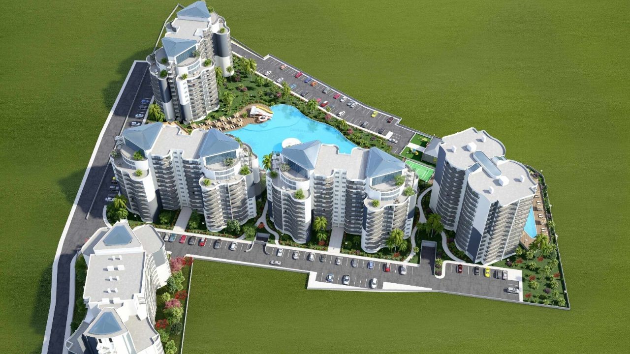 İSKELE LONGBEACH DE ÖDÜLLÜ BİR PROJE DE SATILIK DAİRELER 98,500stg'den BAŞLAYAN FİYATLARLA 