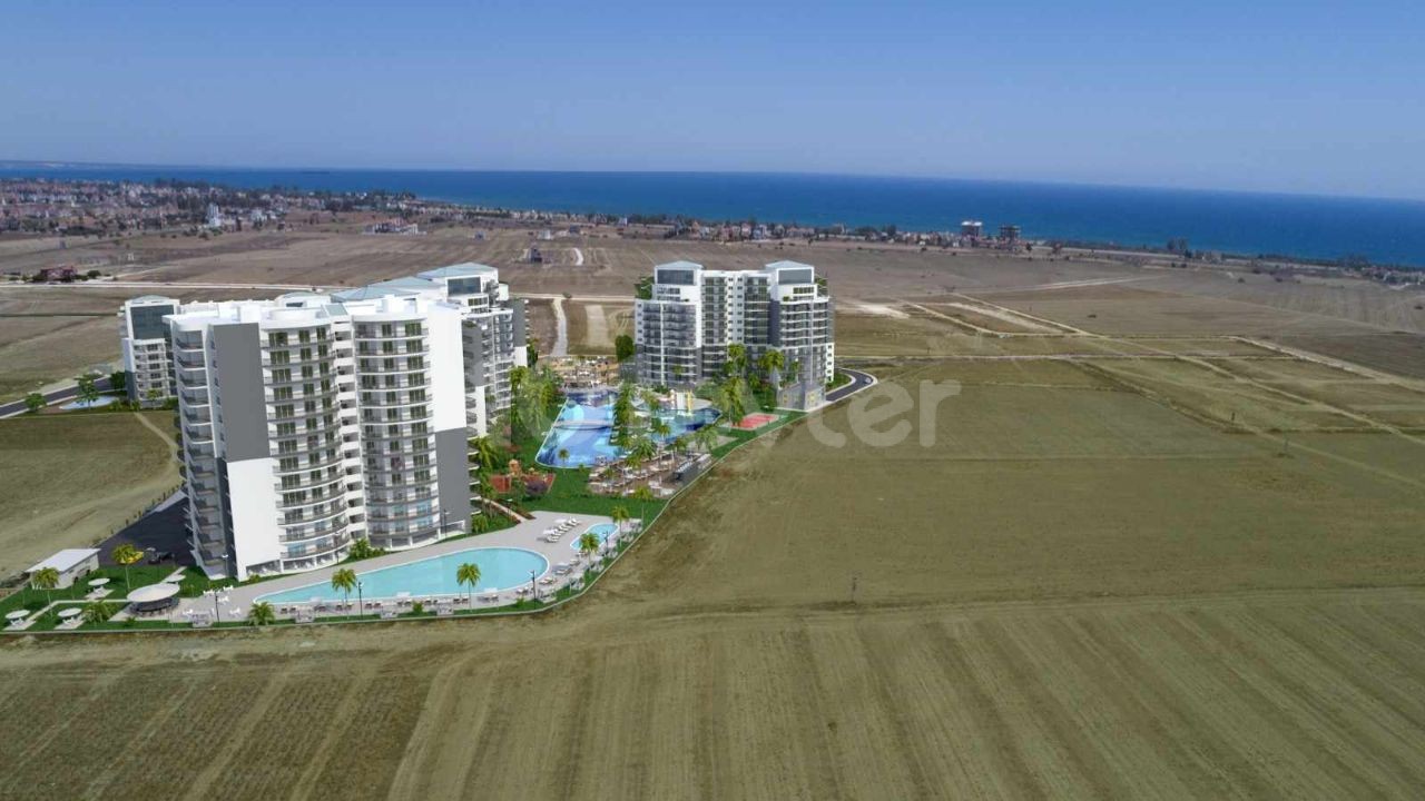 İSKELE LONGBEACH DE ÖDÜLLÜ BİR PROJE DE SATILIK DAİRELER 98,500stg'den BAŞLAYAN FİYATLARLA 