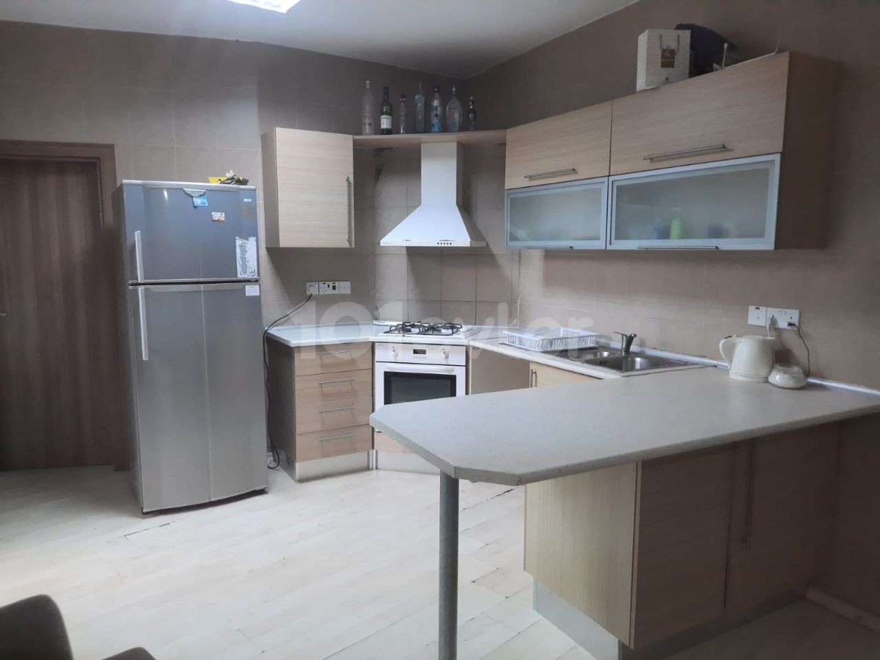 Girne Merkez'de Zemin Kat Eşyalı 2+1 85m2 Satılık Daire 65,000stg 