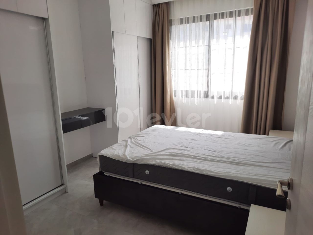 Zeytinlikte 3+1 135m2  Ful Eşyalı Zeminkat Bahçeli Satılık Daire 159.900stg