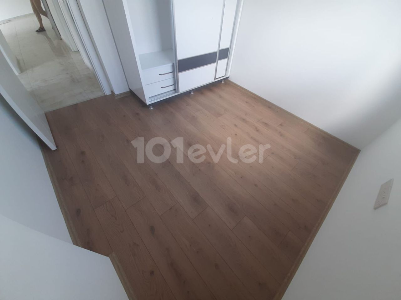 2+1 flats for sale in iskele long beach unfurnished flats 85 square meters 130.000 STG WALKING DISTANCE TO THE SEA QUALITY WORKMANSHIP 3rd floor flat is at the back.