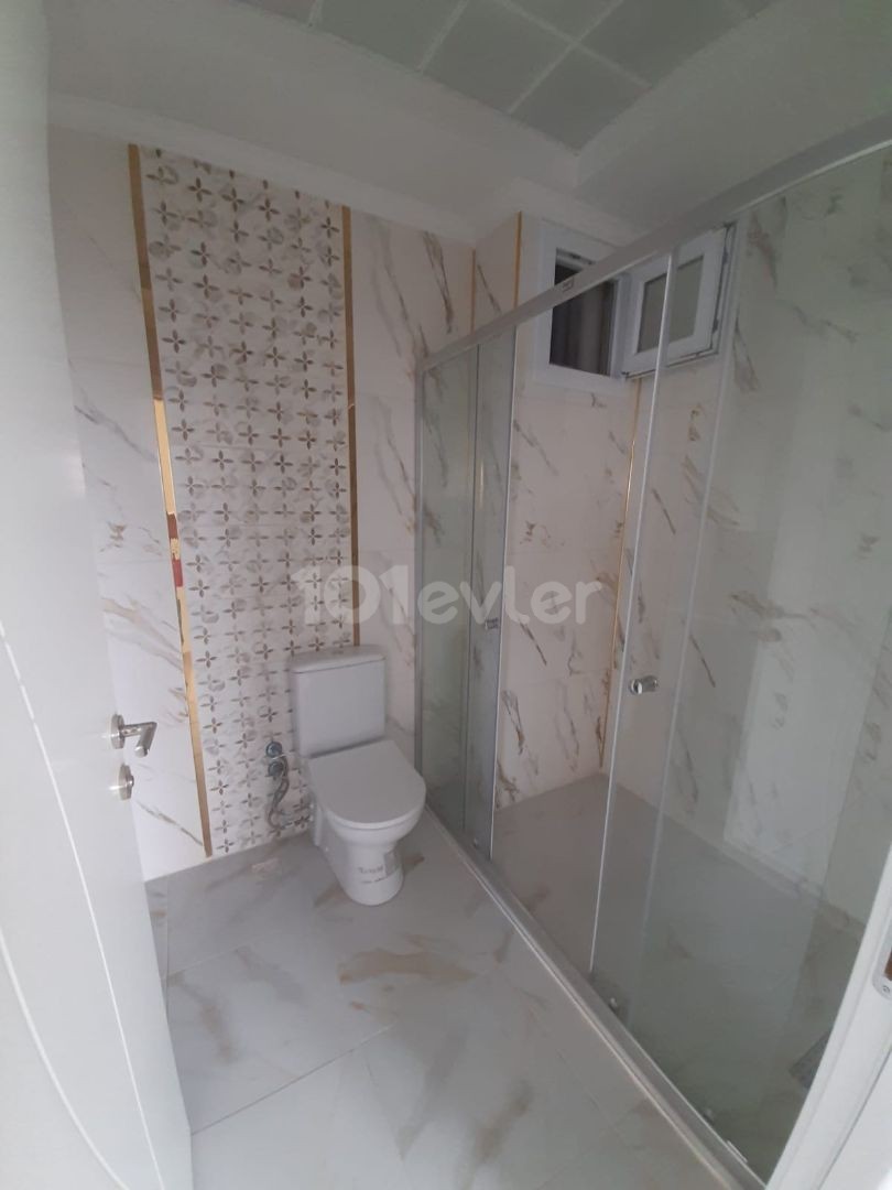 2+1 flats for sale in iskele long beach unfurnished flats 85 square meters 130.000 STG WALKING DISTANCE TO THE SEA QUALITY WORKMANSHIP 3rd floor flat is at the back.