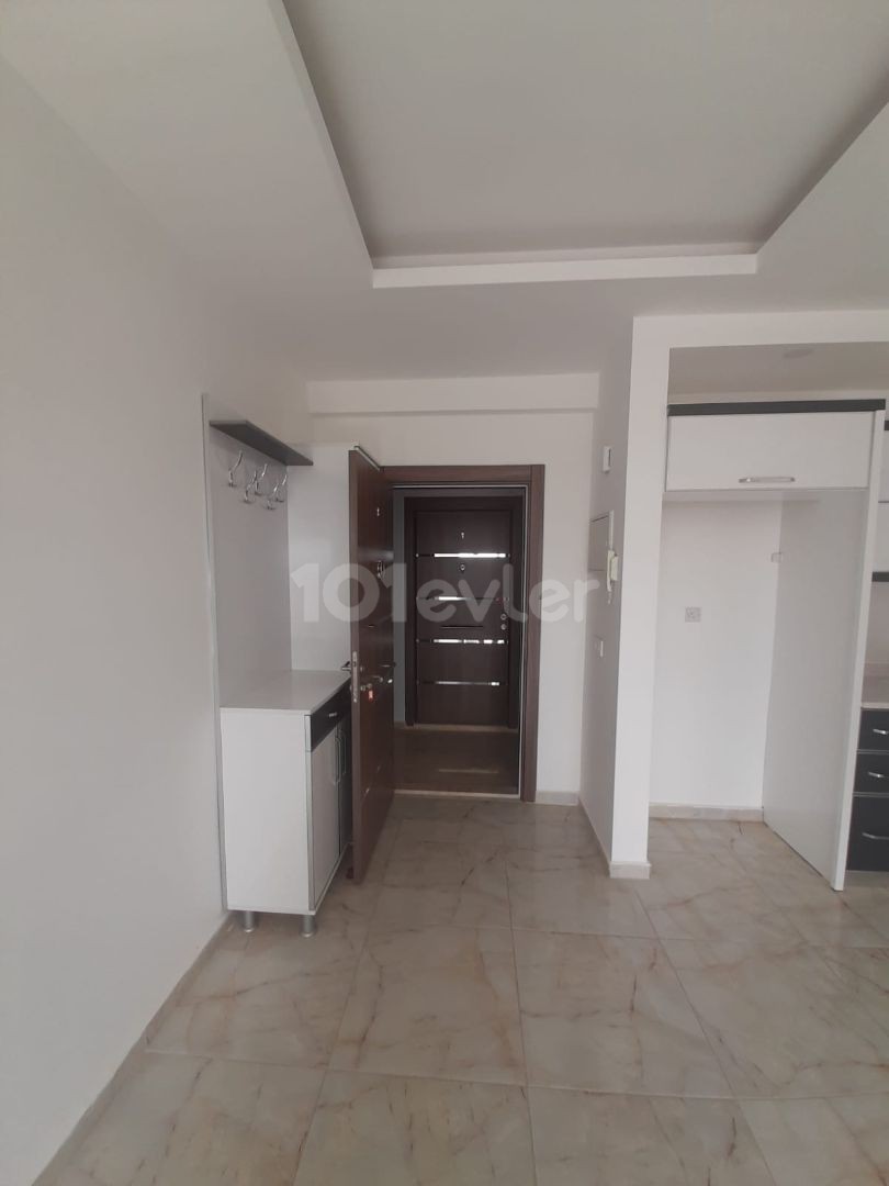 2+1 flats for sale in iskele long beach unfurnished flats 85 square meters 130.000 STG WALKING DISTANCE TO THE SEA QUALITY WORKMANSHIP 3rd floor flat is at the back.