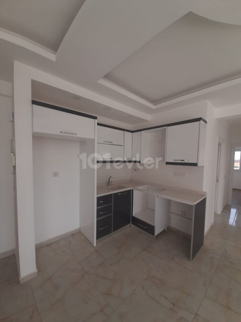 2+1 flats for sale in iskele long beach unfurnished flats 85 square meters 130.000 STG WALKING DISTANCE TO THE SEA QUALITY WORKMANSHIP 3rd floor flat is at the back.