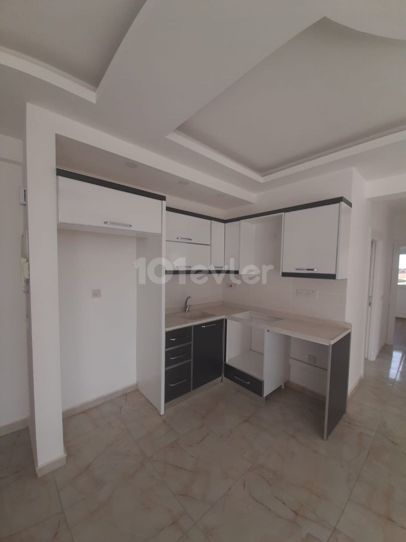 2+1 flats for sale in iskele long beach unfurnished flats 85 square meters 130.000 STG WALKING DISTANCE TO THE SEA QUALITY WORKMANSHIP 3rd floor flat is at the back.