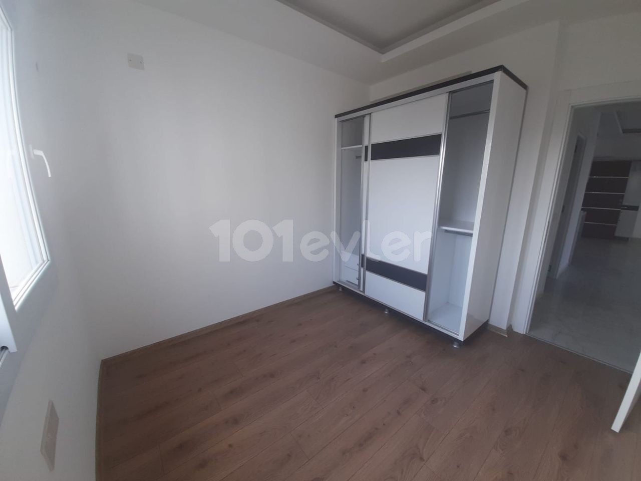 2+1 flats for sale in iskele long beach unfurnished flats 85 square meters 130.000 STG QUALITY WORKMANSHIP WALKING DISTANCE TO THE SEA. FLAT IS ON THE 1st FLOOR.