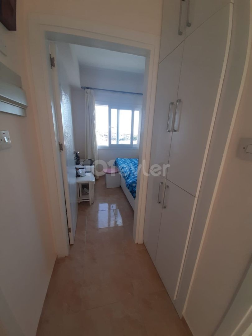 2+1 fully furnished flat for sale in a site with a pool in Yeniboğazi, 78,000 STG equivalent INVESTMENT OPPORTUNITY 80 SQUARE METERS ON THE 3RD FLOOR.