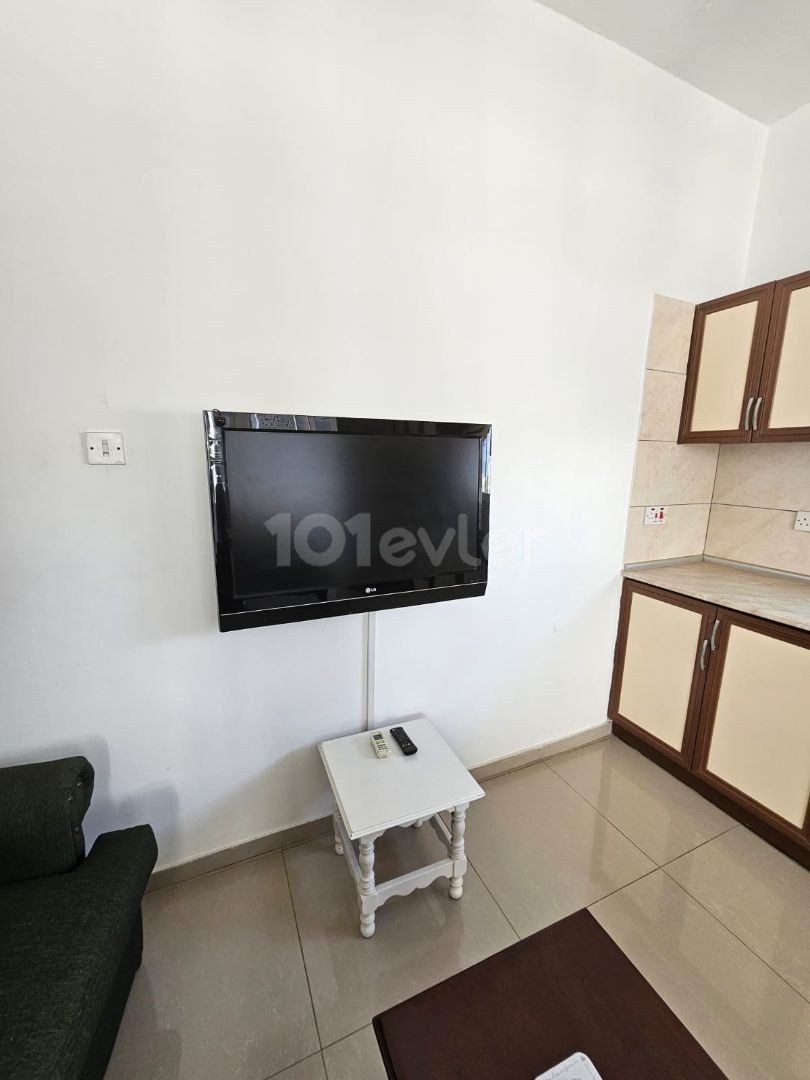 2+1 flat for rent in Eastern Mediterranean University 10 months payment 5000 dollars rent deposit 500 dollars commission 500 dollars water 11 months 1500 TL electricity card system on the top floor 3rd floor no elevator