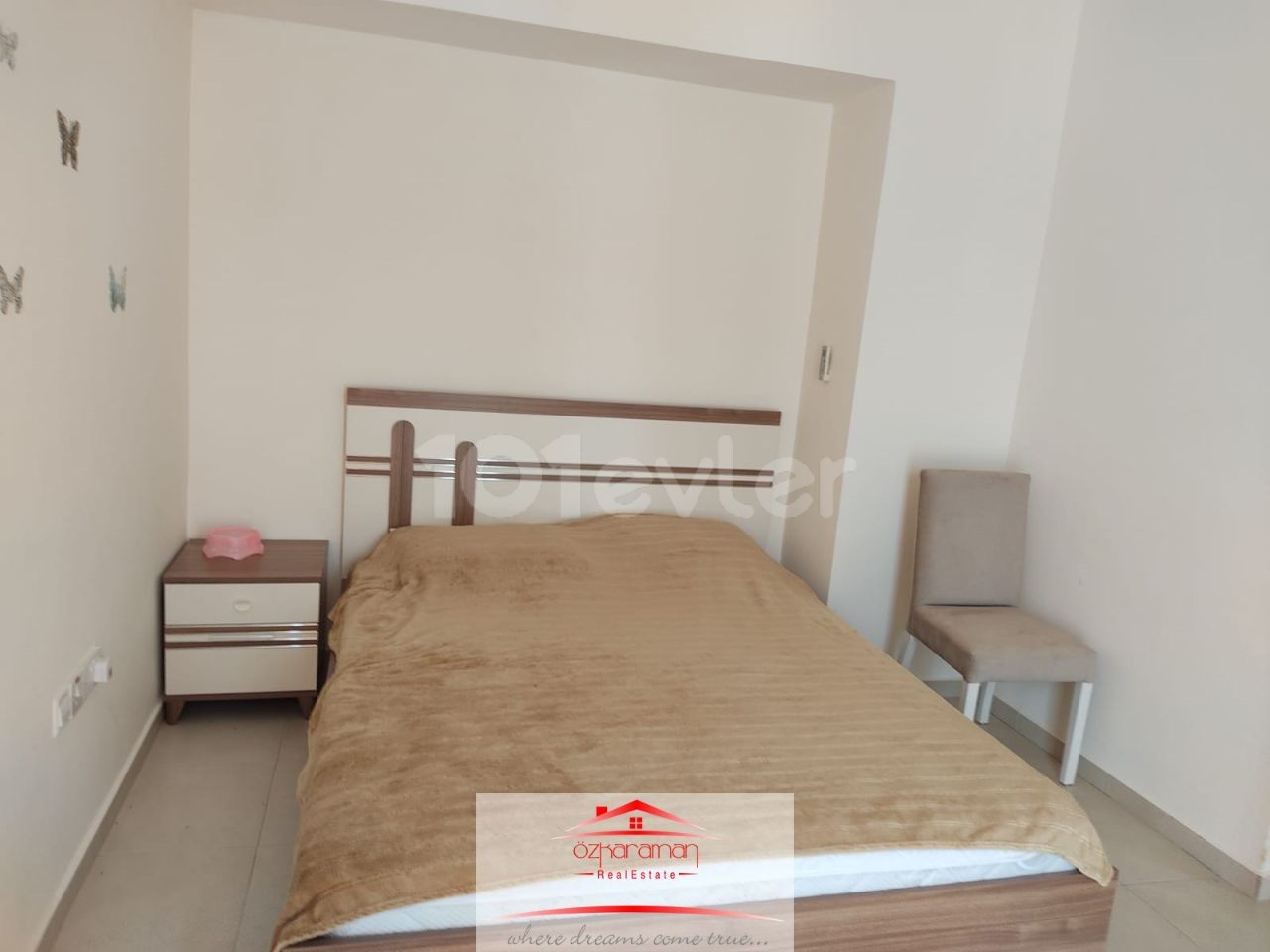 ÖZKARAMAN'dan  İskele-Boğaz Caesar Beach de kiralık 2+1 Daire