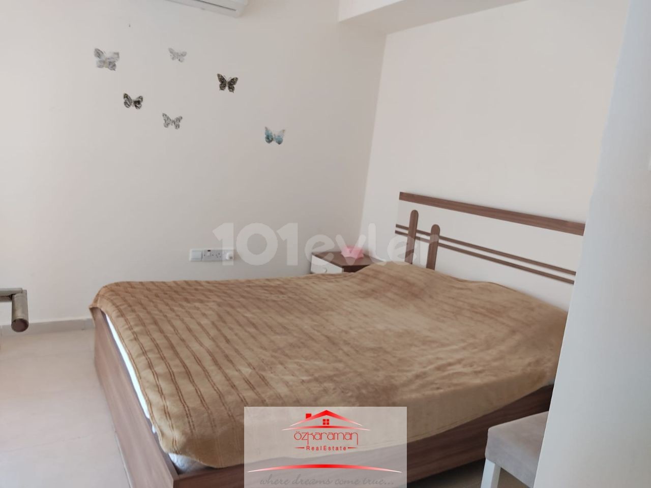 ÖZKARAMAN'dan  İskele-Boğaz Caesar Beach de kiralık 2+1 Daire