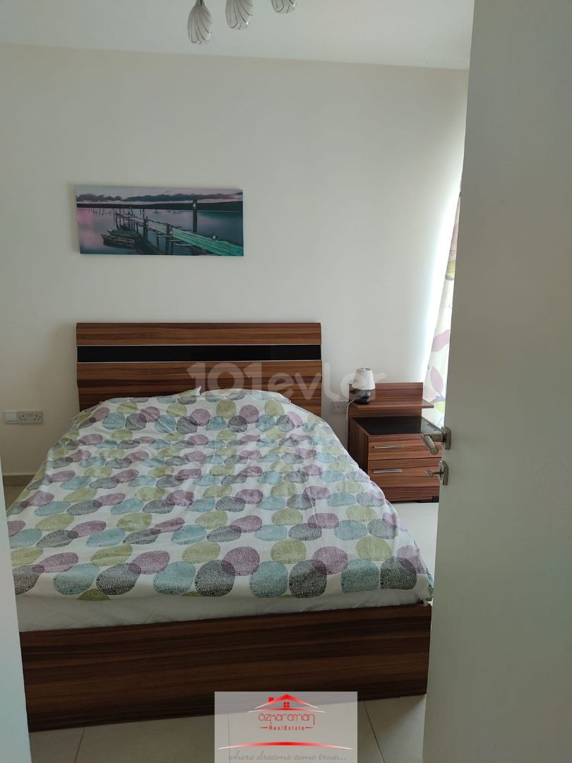 ÖZKARAMAN'dan  İskele-Boğaz Caesar Beach de kiralık 2+1 Daire