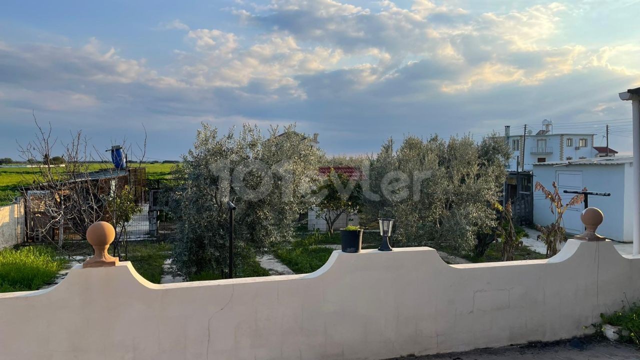 A DETACHED HOUSE WITH A GARDEN ON 1 ACRE OF LAND IN THE VILLAGE OF FAMAGUSTA MUTLUYAKA ** 