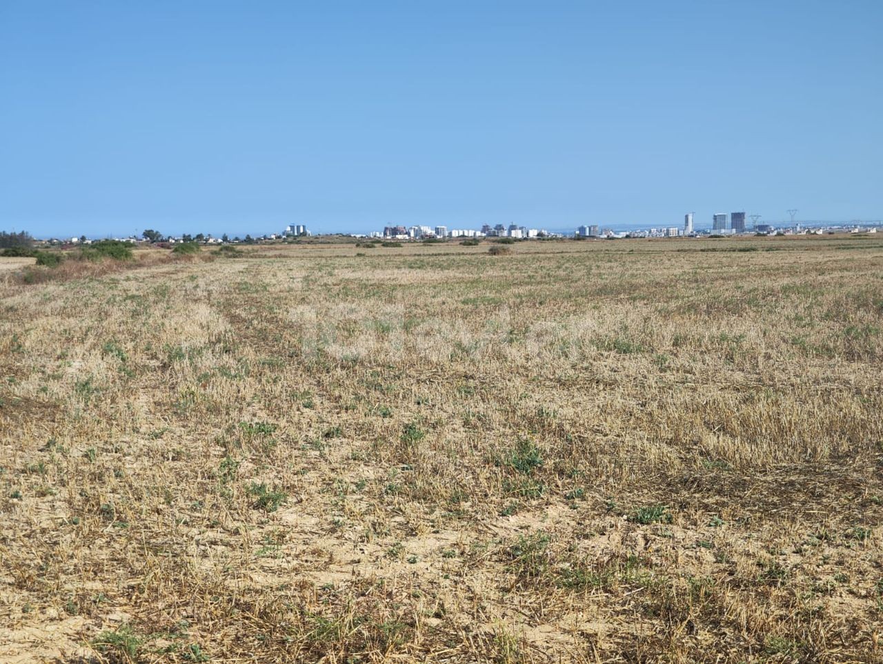 LAND WITH OFFICIAL ROAD IN İSKELE REGION WITH 23 DECEMBER 1 EVLEK