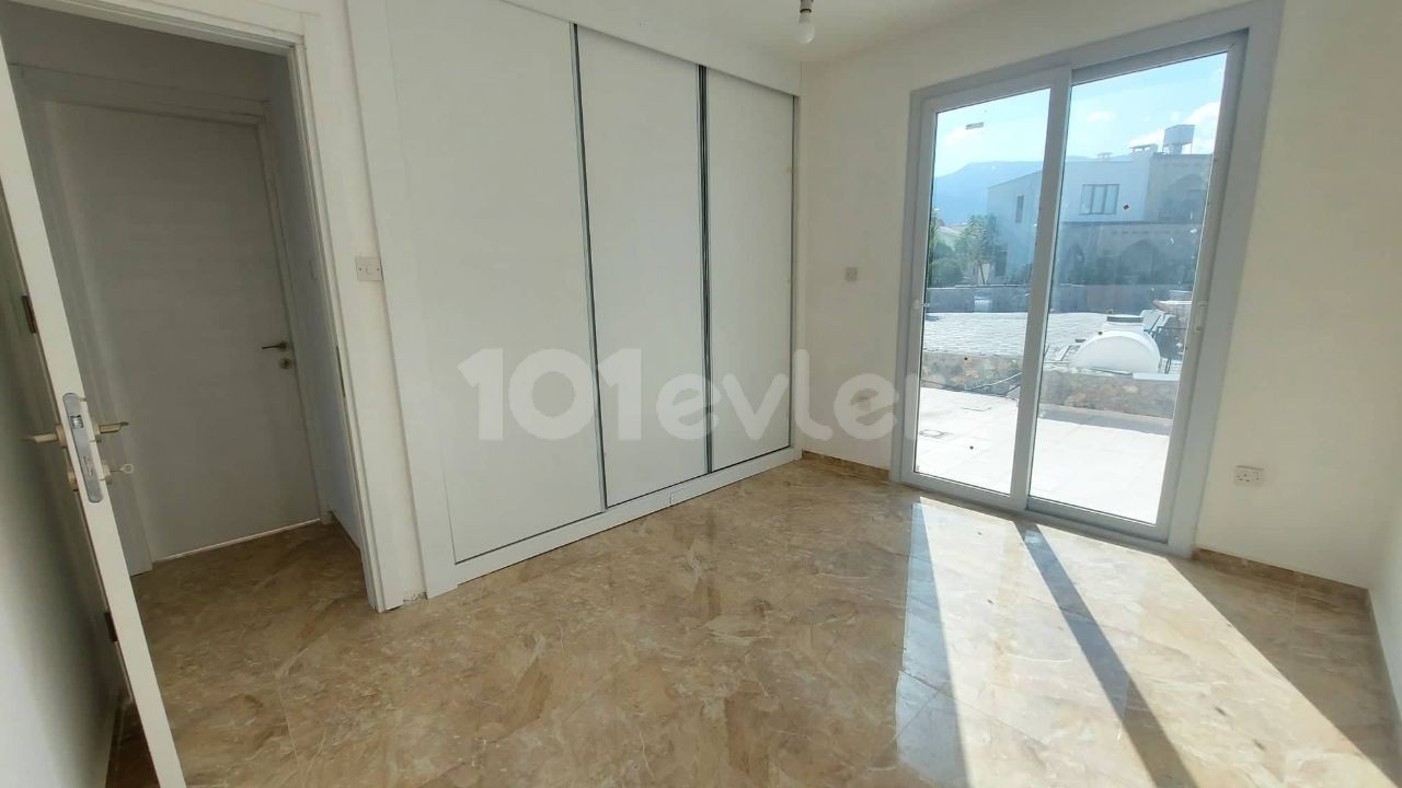 2 bedroom garden floor apartment for sale in Alsancak