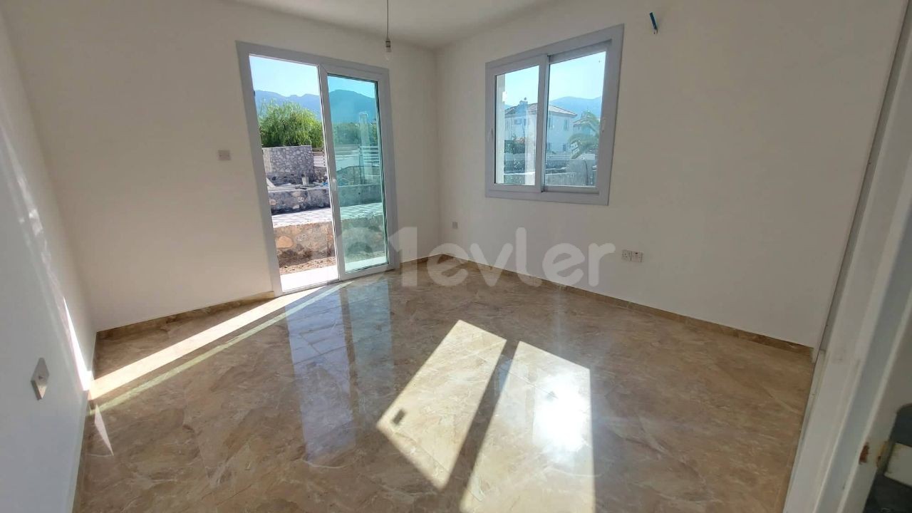 2 bedroom garden floor apartment for sale in Alsancak