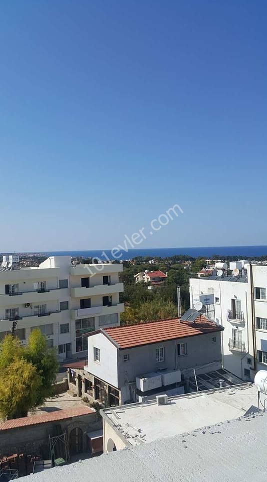 IN THE CENTER OF ALSANCAK WITH SEA AND MOUNTAİN VIEW 3+1 NEW APARTMENTS FOR SALE