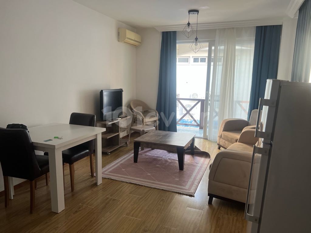 1+1 flat for rent in a residence with pools in Kyrenia Center 