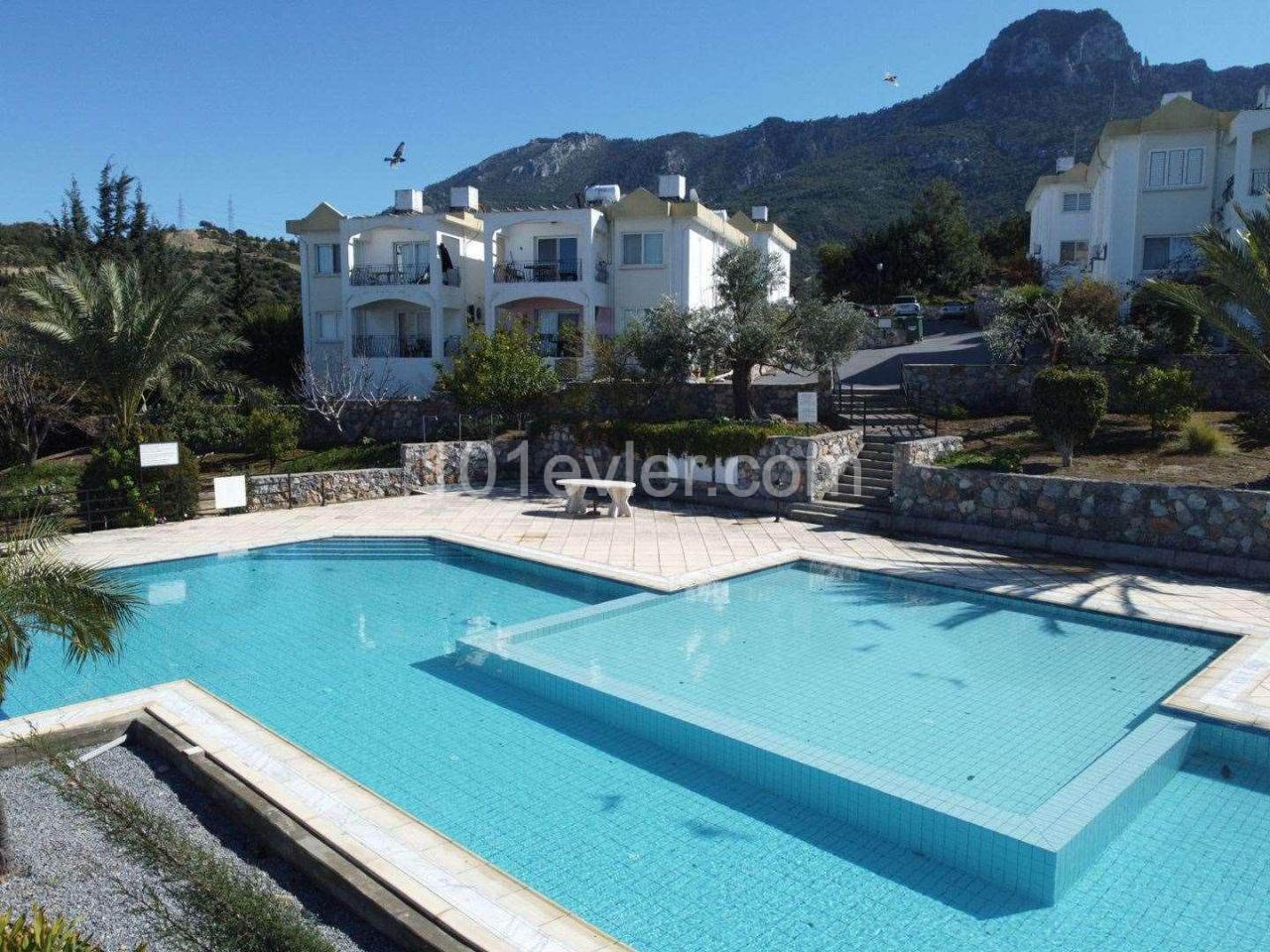 2 + 1 Apartments for Sale in Kyrenia /Çatalköy on a Decent, Quiet Site with a Pool, Intertwined with Nature ** 