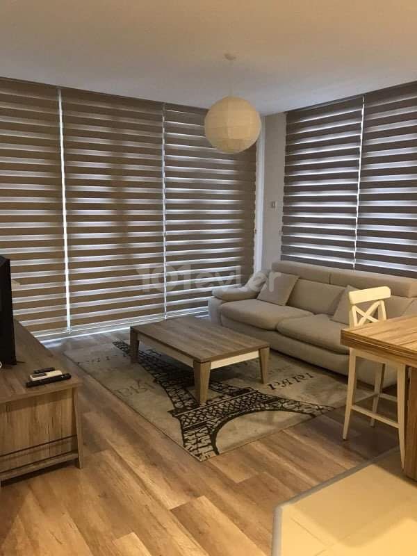 Girne Merkezde Her yere yakın güvenlik - asansör -bariyerli otopark -jeneratör hizmeti bulunan residence binada kiralık 2+1 FULL eşyalı daire