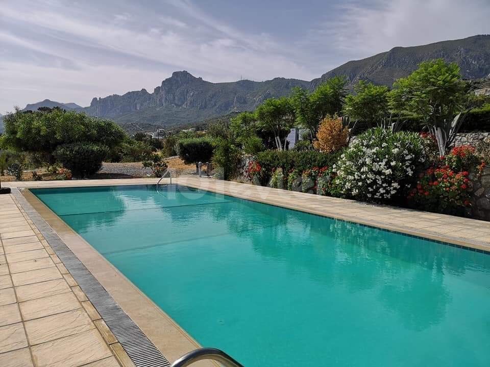 OPPORTUNITY...2+1 FULLY FURNISHED GROUND FLOOR APARTMENT IN EDREMIT, THE PEARL OF KYRENIA, OFFERING 2 SWIMMING POOLS AND A PRIVATE LARGE GARDEN-BARBECUE FOR YOUR HOME ** 