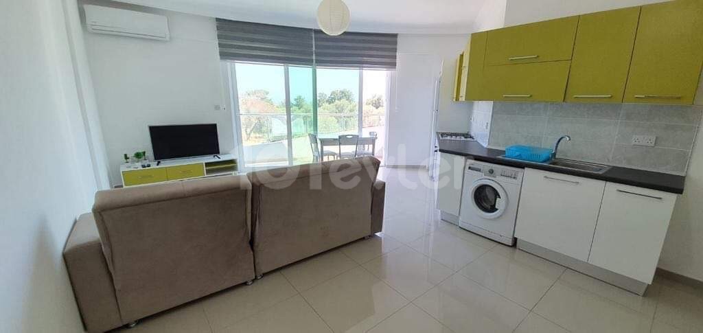 FIRSATT ✨ ..A FULLY FURNISHED 1 + 1 APARTMENT WITH A TERRACE OF 60m2 INDOOR AREA 40m2 WITH A GREAT VIEW, SUITABLE FOR AN EQUIVALENT LOAN OF KOCHAN IN THE KARAOGLANOGLU DISTRICT OF KYRENIA ** 