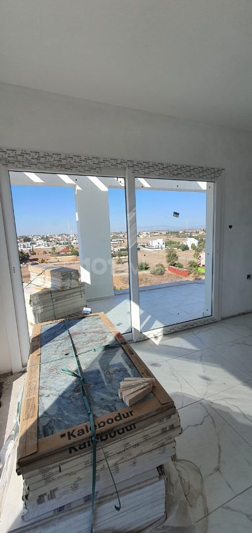 A PENTHOUSE FOR 78,000 POUNDS AT AN UNMISSABLE PRICE IN YENIBOGAZ. IT IS BUILT WITH 1ST CLASS MATERIALS 600 METERS FROM THE SEA. DELIVERY DATE October 2022 ** 