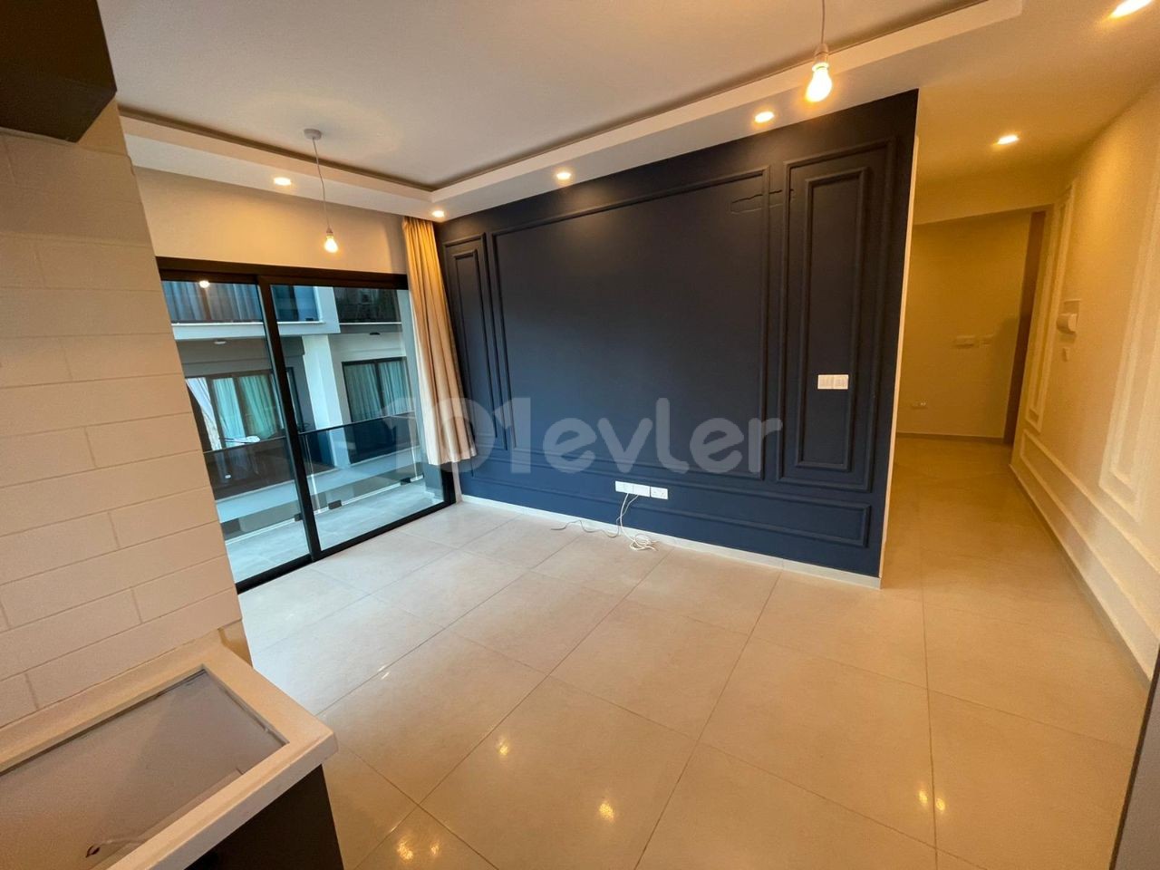 LUXURIOUS 2+1 FLAT FOR SALE IN KYRENIA CENTER WITH POOL